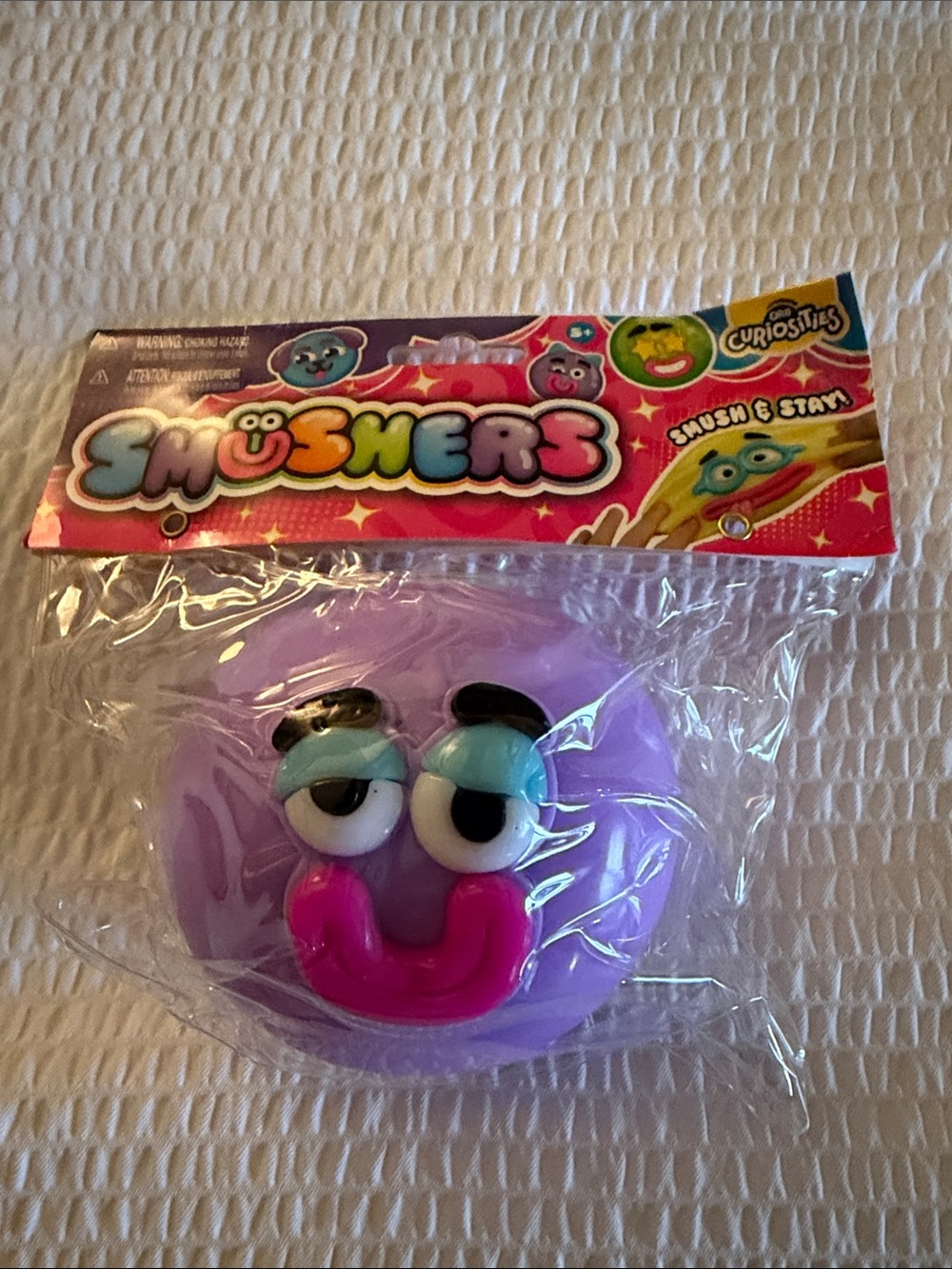 Usher Purple Squisher Toy with Pink Smile